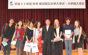 Seven YCCS students with President Suzuki
